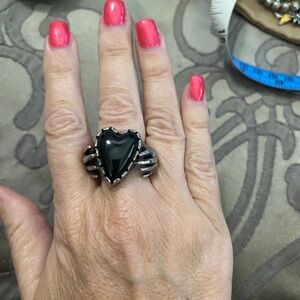 Unique Black onyx Heart held by Hands Silver Ring